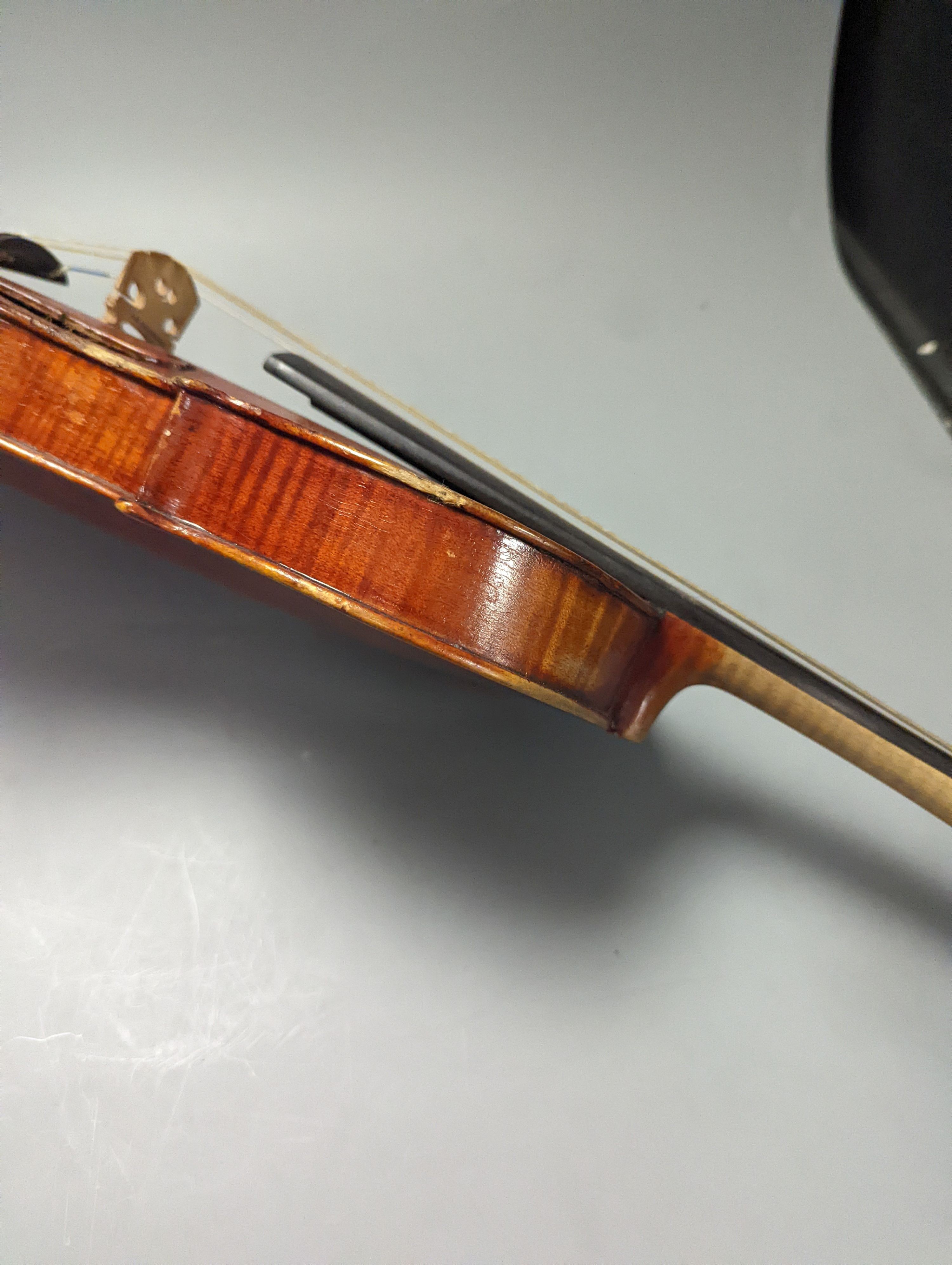 A violin in a mahogany case, case makers, Withers and sons, case 79 cms high.